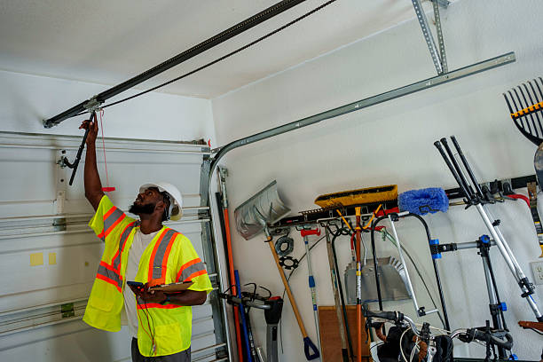 Professional Garage Door Installation technician working in Man, WV